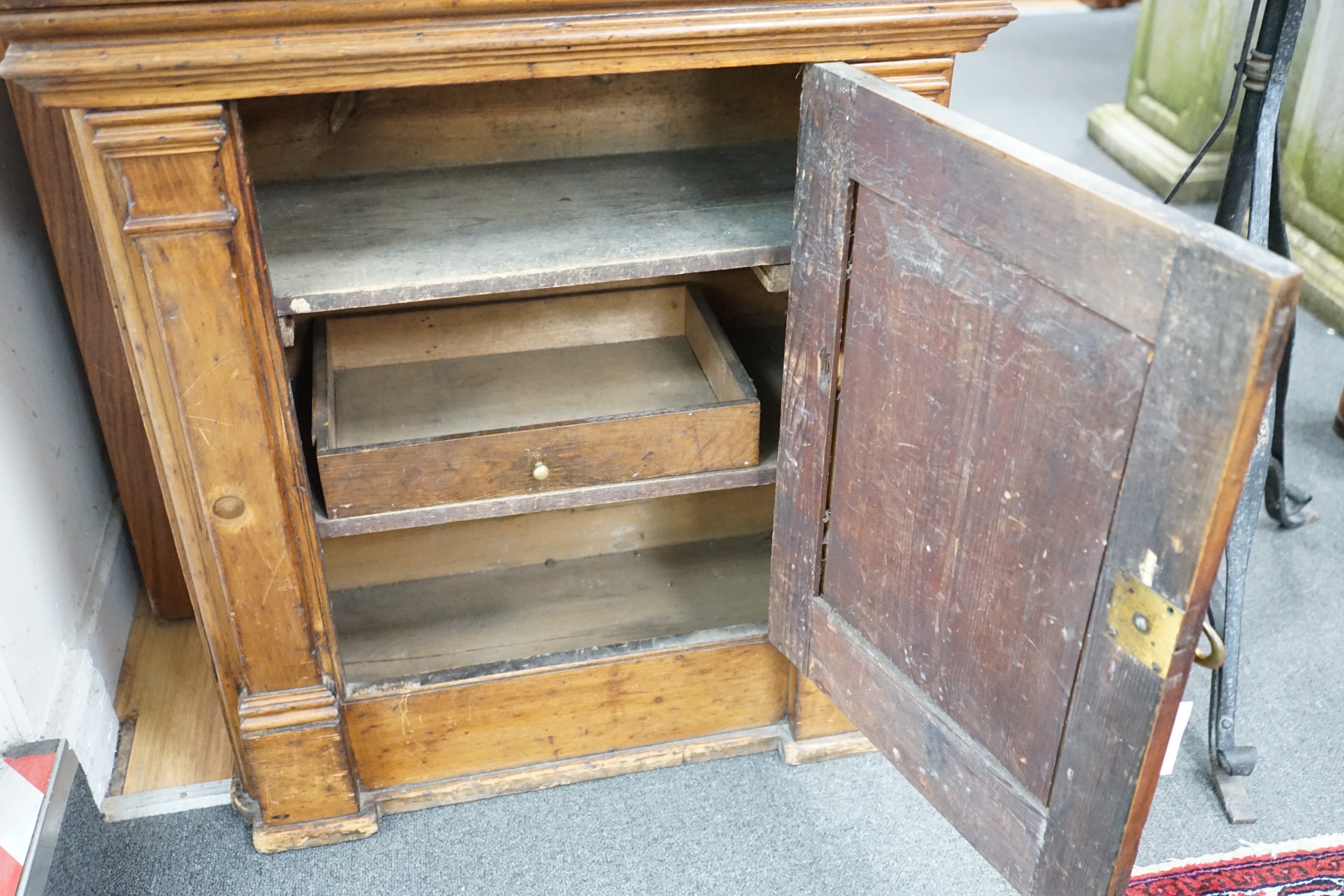An 18th century Italian pine pier cabinet, width 71cm, depth 36cm, height 79cm *Please note the sale commences at 9am.
